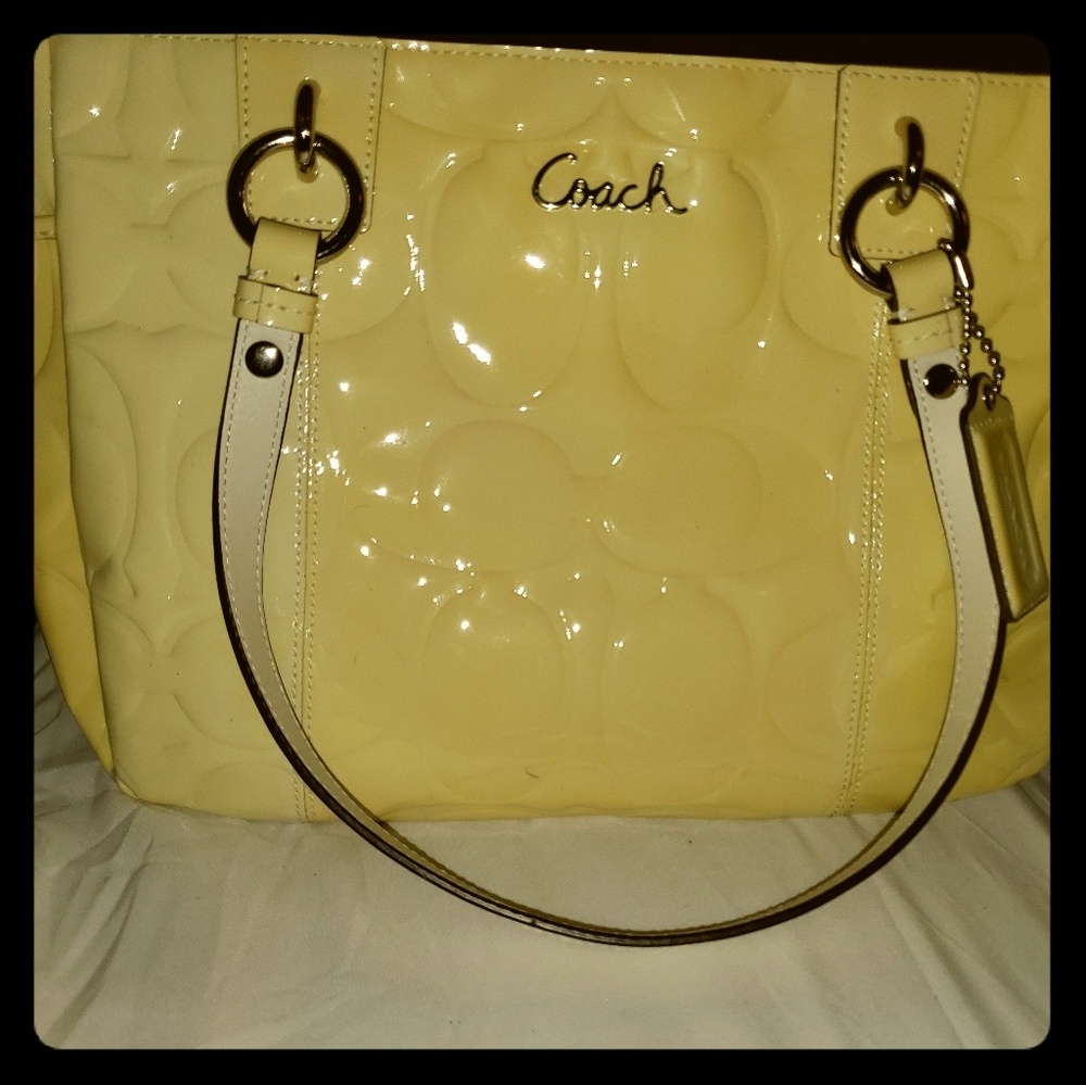 Yellow and off white Coach handbag